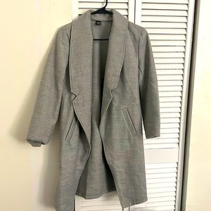 Gray beautiful overcoat never used .shipping is on Friday